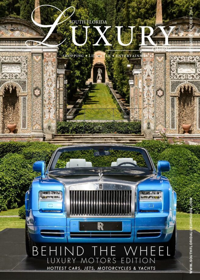 Luxury Guide Cover Sept-Oct 2014 South Florida Luxury Guide cover featuring a blue Rolls-Royce convertible posed before an ornate formal garden.