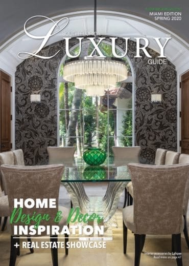 Luxury Guide Cover Spring 2020 South Florida Luxury Guide Miami Spring 2020 cover featuring an elegant dining room with patterned walls, a glass table, chandelier, and green centerpiece.